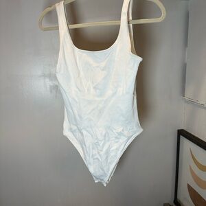 Elegant White Ribbed Bodysuit